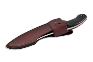 Che knife in the leather sheath.