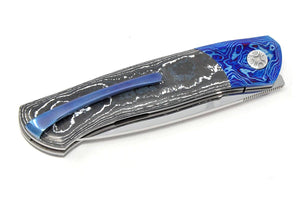 Folded knife, titanium pocket clip.